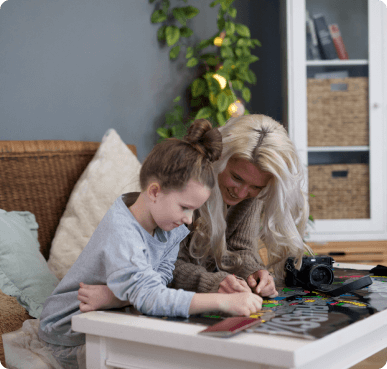 Mother and daughter scratching map